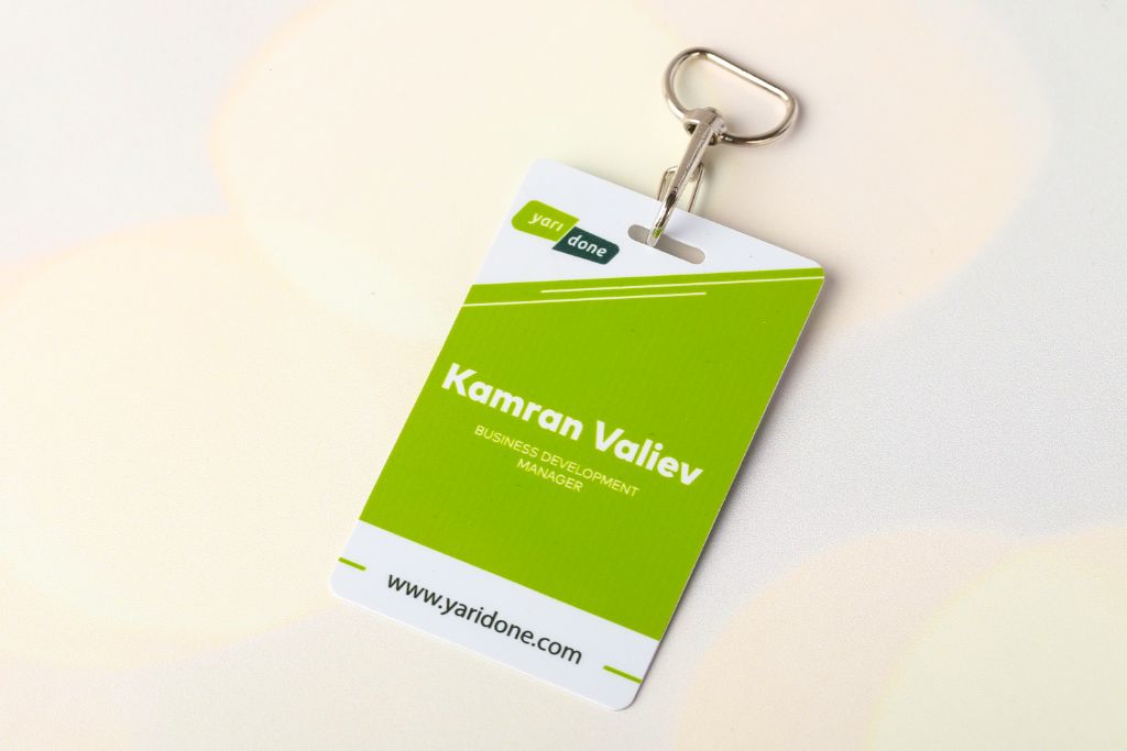 Badge Yaridone — Kamran Valiev, Business Development Manager, green, with carabiner and D-ring, front side