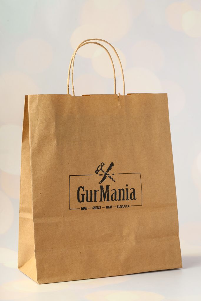 GurMania kraft bag — brown kraft paper, twisted paper handle, silkscreen logo: Wine, Cheese, Meat, BlaBlaBla