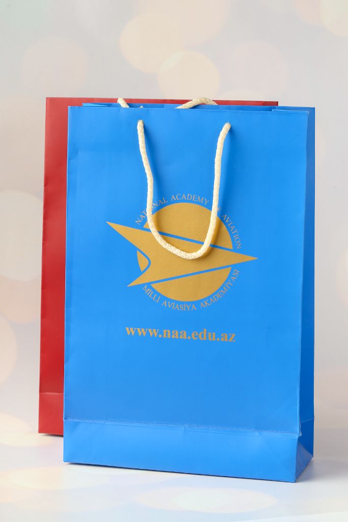 Milli Aviasiya Akademiyası (NAA) bag — blue gloss, gold emblem and logo, white rope handle