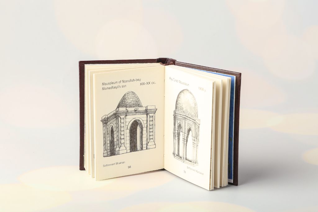 Open miniature book — illustrations of Absheron mausoleums, 19th–20th century