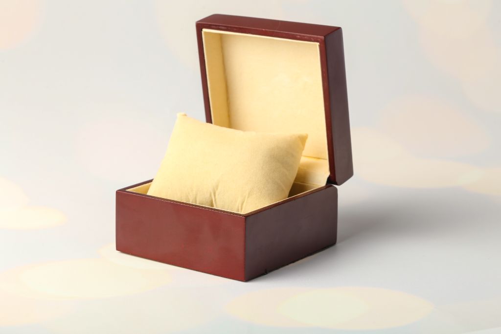 VIP watch box — burgundy MDF lacquer, open, cream velvet pillow