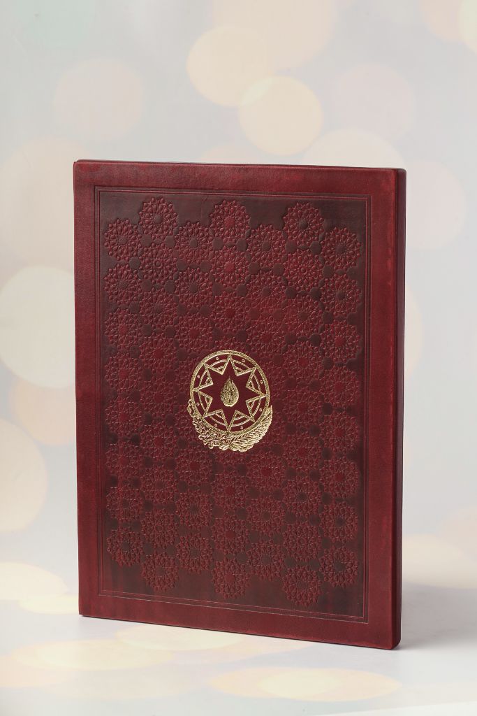 Government leather folder — arabesque embossing, gold coat of arms