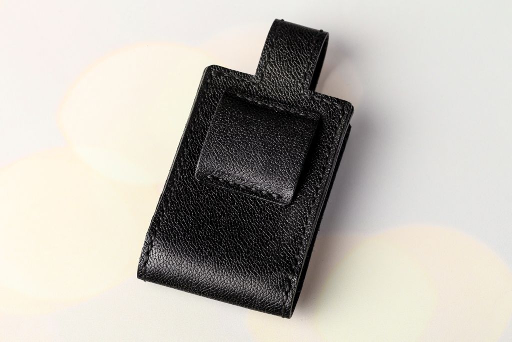Leather card holder open — black leather, card pockets