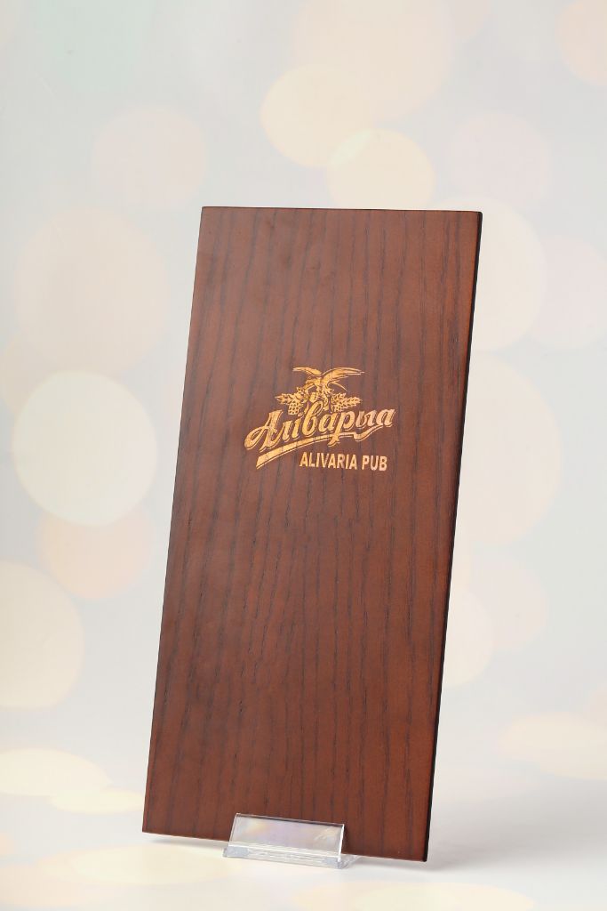 Alivaria Pub menu cover — engraved wood cover, full view