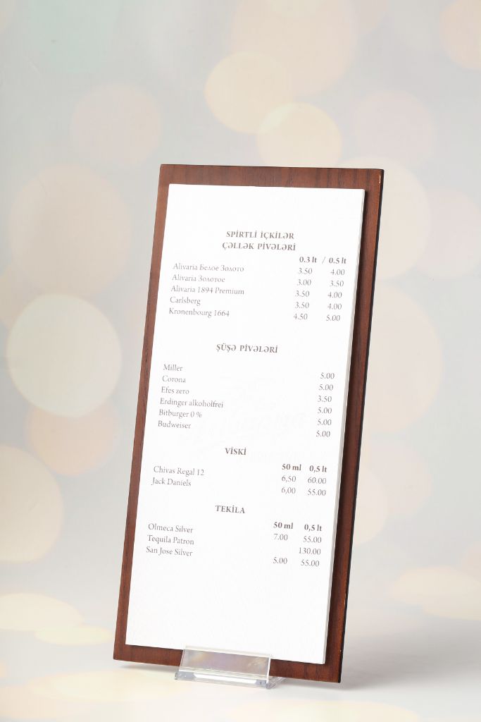 Alivaria Pub menu — wooden clipboard with Spirits insert, acrylic stand