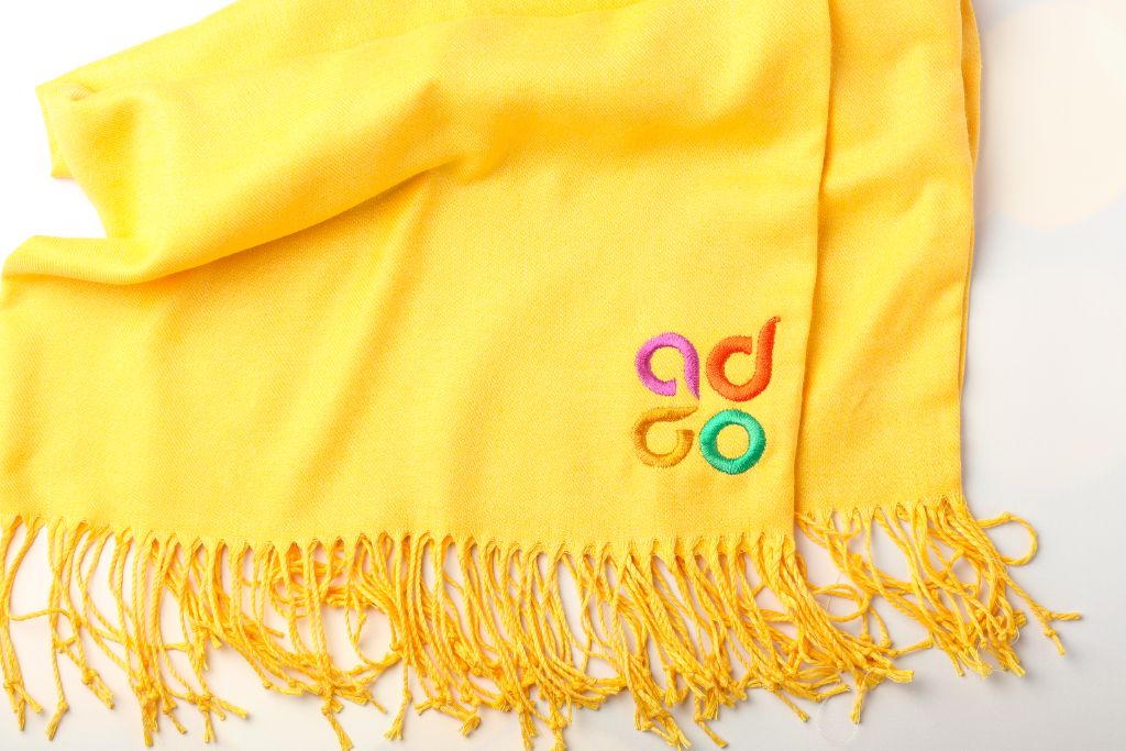 ADGO scarf — yellow with fringe, multicolour ADGO logo embroidery, cashmere