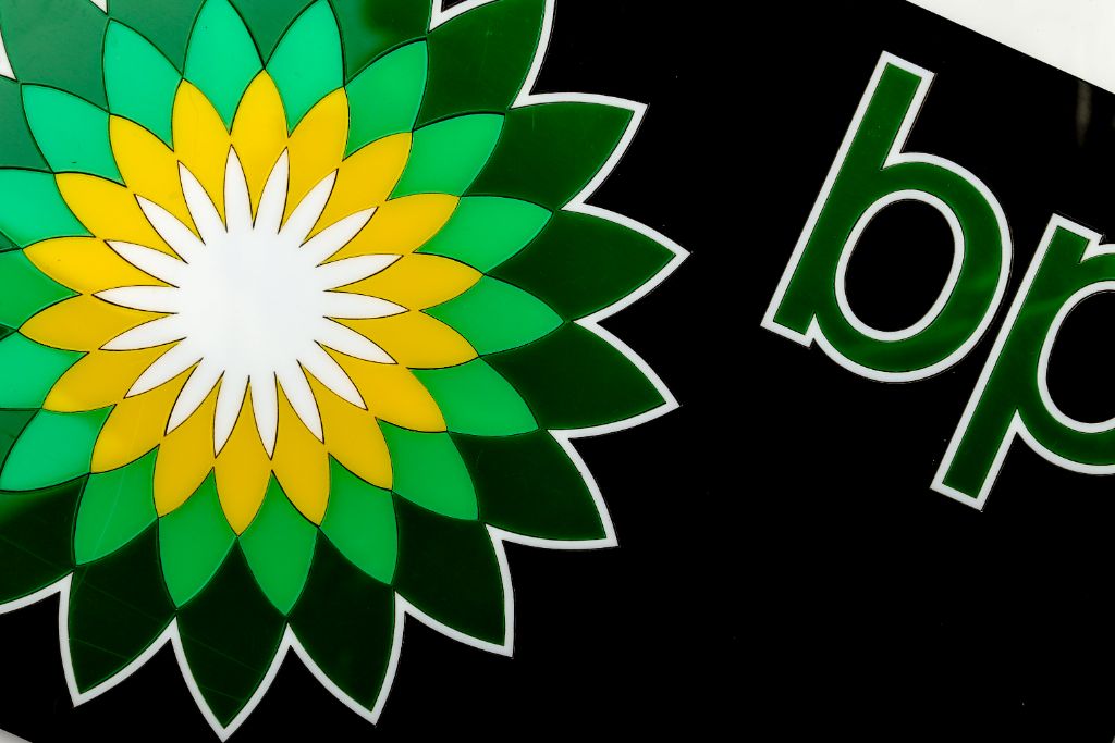 BP corporate fascia — close-up of logo, green and yellow acrylic, laser cut
