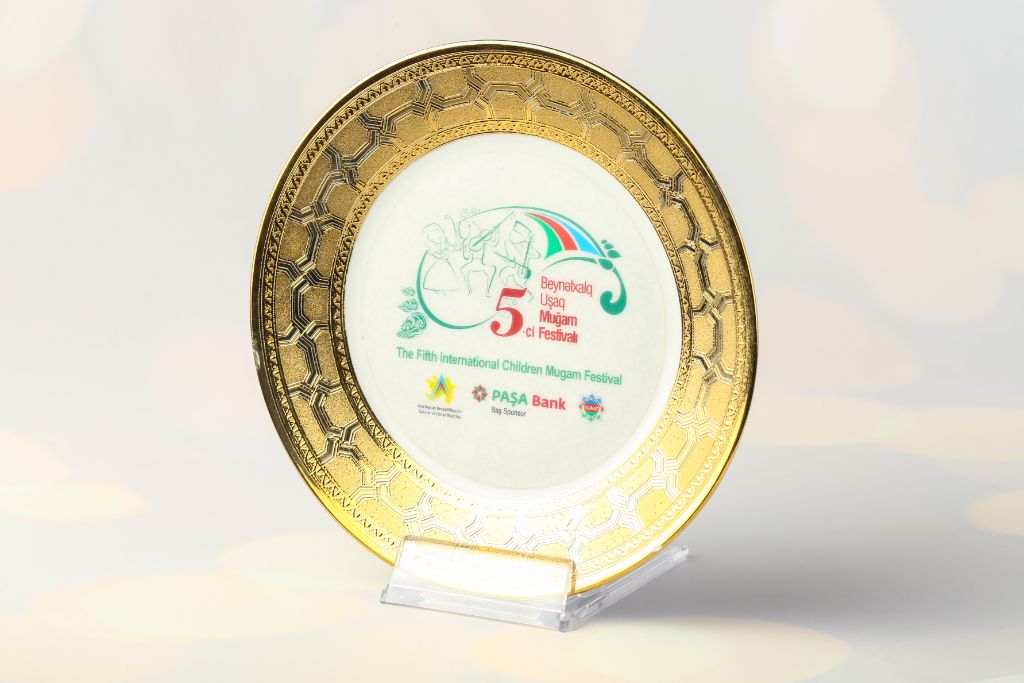 Souvenir plate 5th International Children's Mugam Festival — porcelain, gold rim, full-colour print, stand