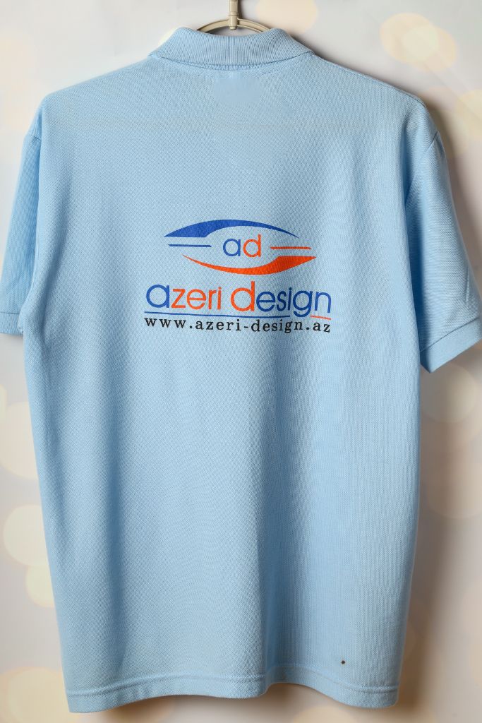 Azeri Design corporate polo — sky blue, back print, rear view
