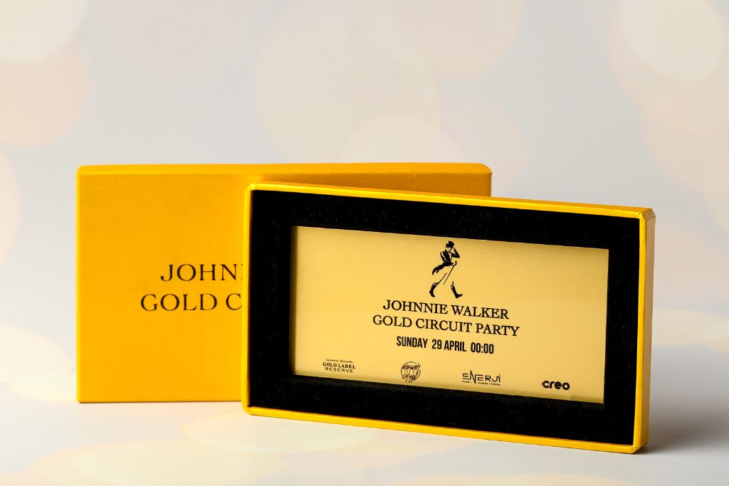Johnnie Walker Gold Circuit Party — gold card in black foam insert of the box